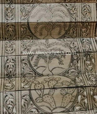 Various tree carving on palm leaf